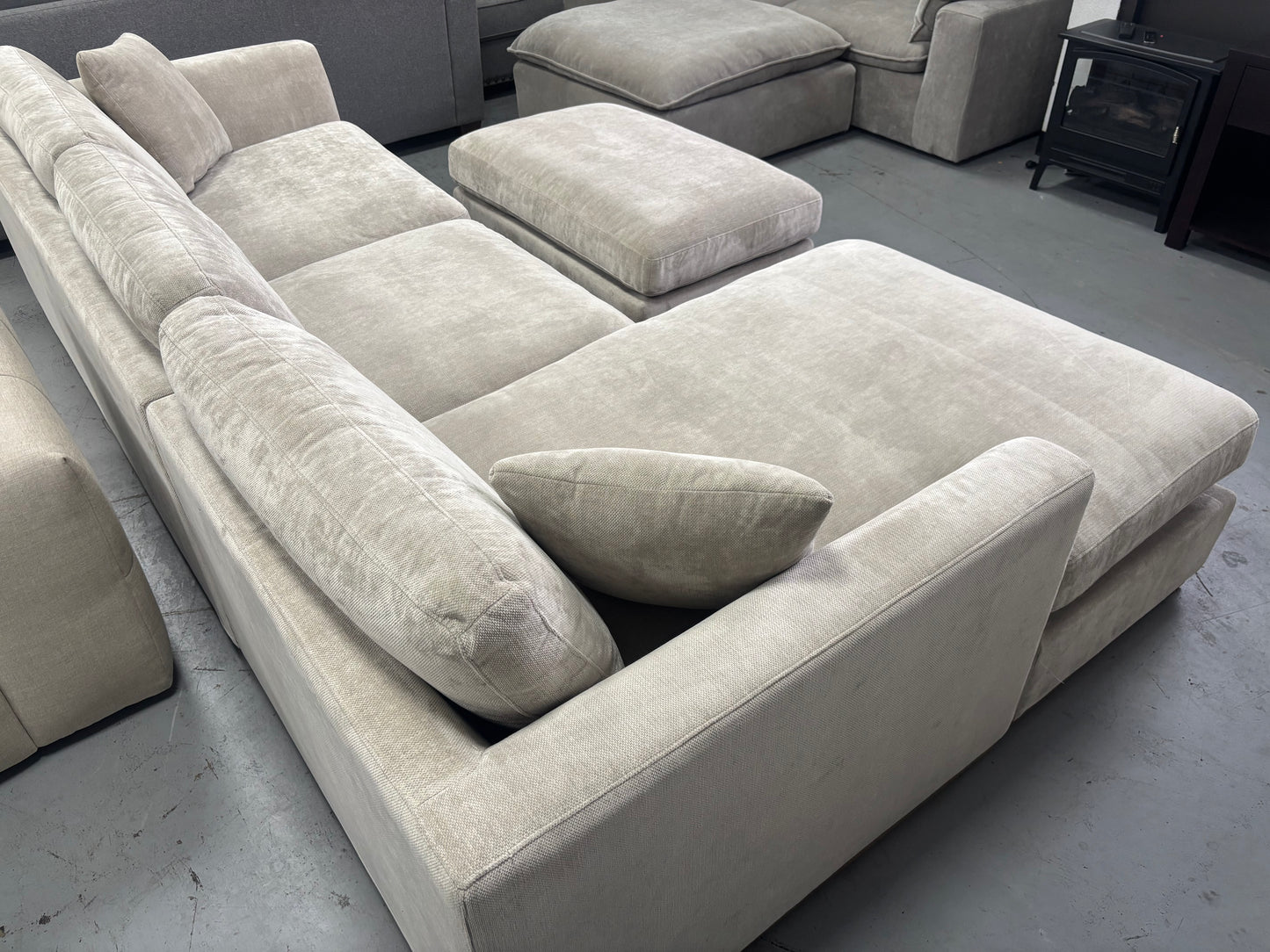 Beige Sectional With Ottoman