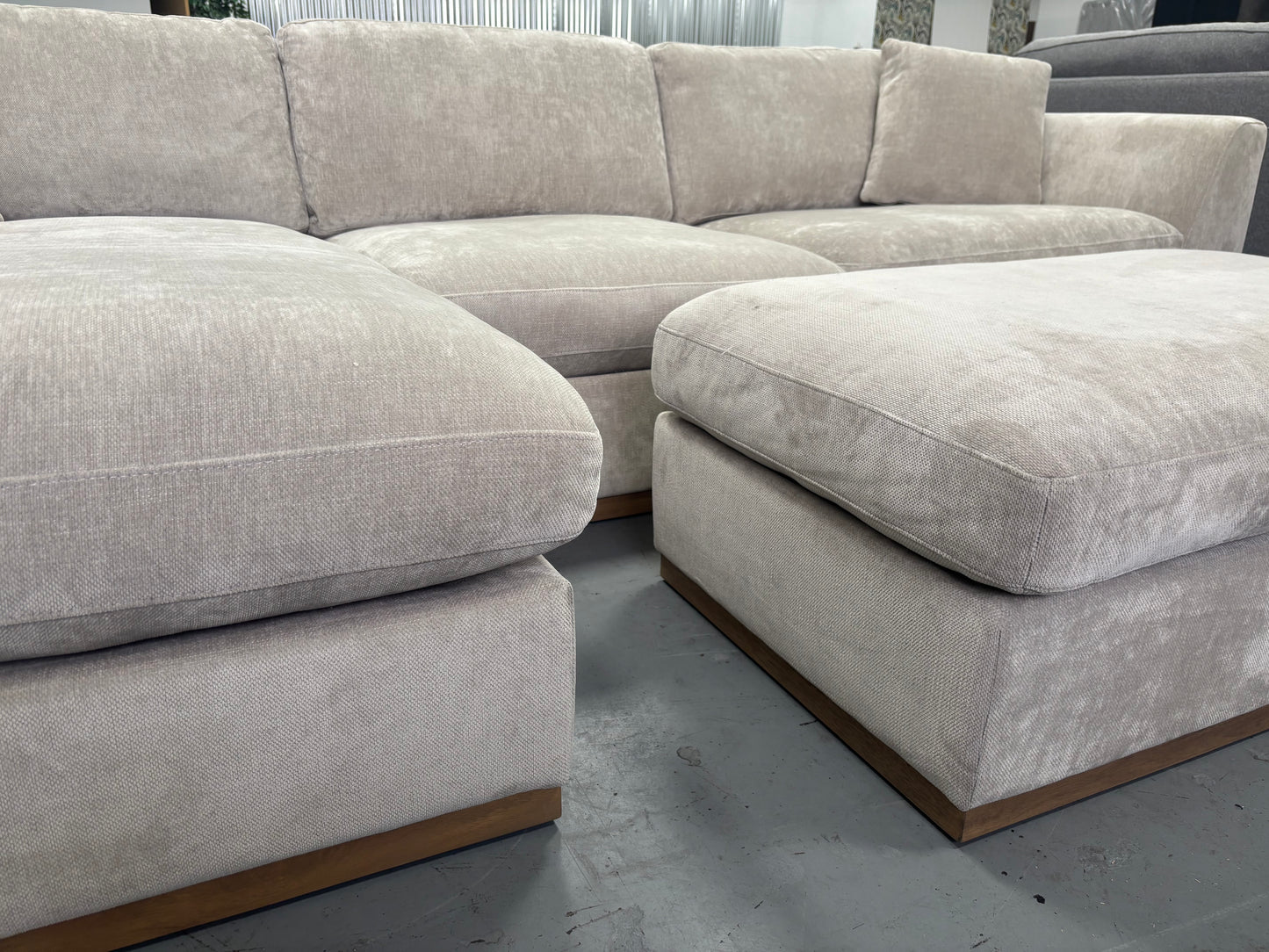Beige Sectional With Ottoman