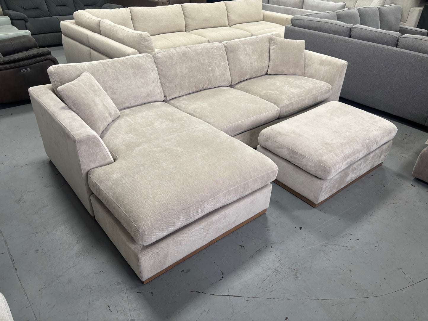 Beige Sectional With Ottoman