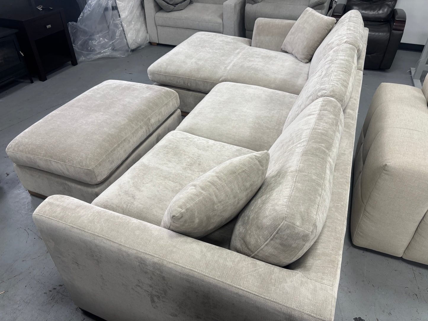 Beige Sectional With Ottoman